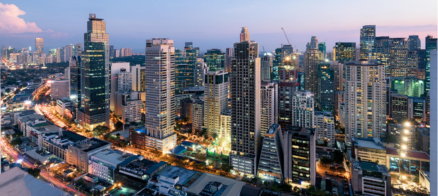 Breathtaking Makati skyline at sunset, Philippines - a symbol of economic growth and modernization.